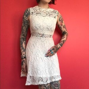 White lace mini dress with peekaboo mid section